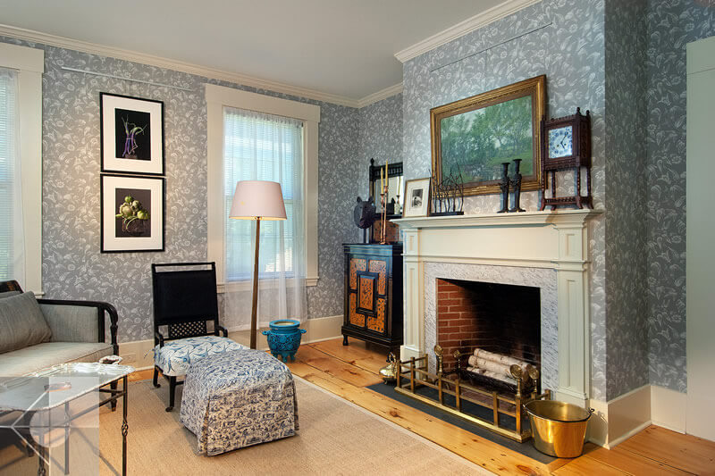 Greek Revival livingroom with fireplace by Phelps Architects.