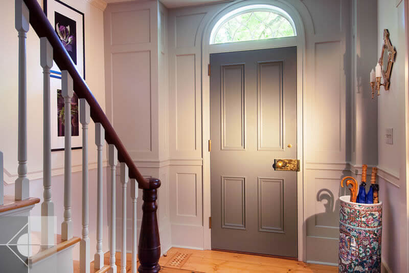Entrance way of Greek Revival home by Phelps Architects.