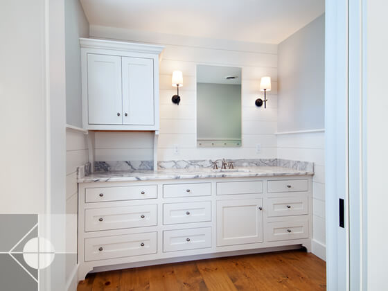Bathroom sink, vanity and custom medicine cabinet.