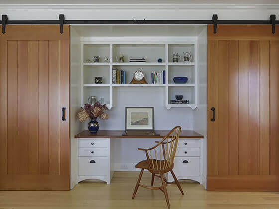 Desk with barn doors on either side.