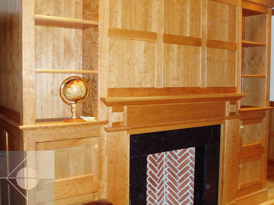 Room with built in shelving.