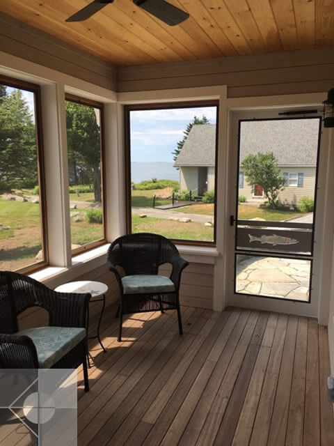 Inside the screened in porch with ocean views.