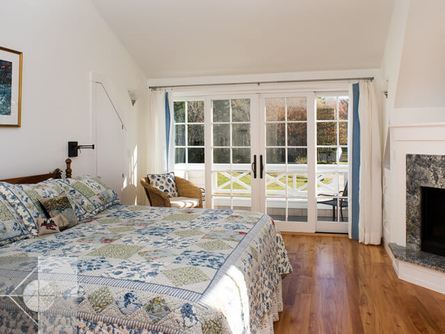 Bedroom with walkout deck.